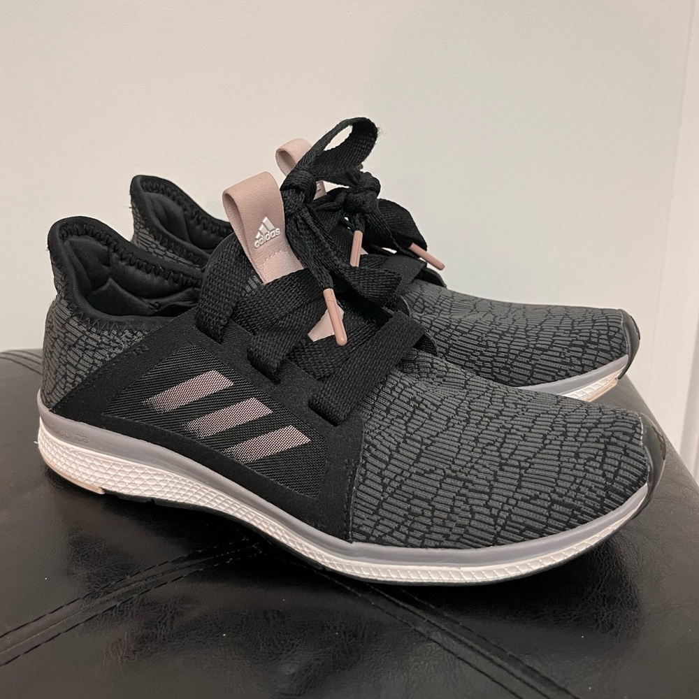 Black and pink Adidas sneakers